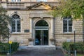 Main entrance of the Higher Regional Court in Karlsruhe, Germany. Beautiful old sandstone building.