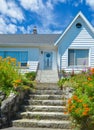 Main entrance of residential house with stone stairway Royalty Free Stock Photo