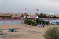 The main entrance to Adventure Planet Tourism - Dubai Desert Safari at the sandy desert near Dubai city, United Arab Emirates