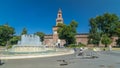 Main entrance to the Sforza Castle - Castello Sforzesco and fountain in front of it timelapse hyperlapse, Milan, Italy Royalty Free Stock Photo