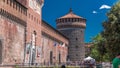 Main entrance to the Sforza Castle and tower - Castello Sforzesco timelapse, Milan, Italy Royalty Free Stock Photo