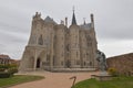 Main Facade Of The Episcopal Palace And An Angel Of The Garden Of Gaudi In Astorga. Architecture, History, Camino De Santiago,