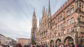 Main facade of the New Town Hall building at the northern part of Marienplatz day to night transition in Munich, Germany Royalty Free Stock Photo