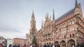 Main facade of the New Town Hall building at the northern part of Marienplatz day to night transition in Munich, Germany Royalty Free Stock Photo