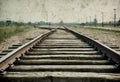 Main gate and railroad to nazi concentration camp of Auschwitz Birkenau. Effect with grunge background, fake old photo