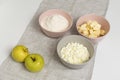 Main ingredients for Apple Pie. Flour, butter, cottage cheese and apples