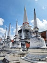 The main larger stupa with a group of small stupas in the Sri Lankan-style at Wat Phra Mahathat Woramahawihan