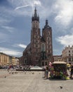 Main market and Basilica of Saint Mary Church of Our Lady Assumed into Heaven also known as Saint Mary`s Church. Cracow in Poland Royalty Free Stock Photo