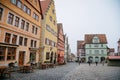 Main market square, colorful renaissance, gothic historical buildings, old town, half-timbered houses, vintage wrought iron signs