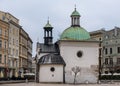 The Main Market Square in Krakow with Church of St. Adalbert Wojciech Royalty Free Stock Photo