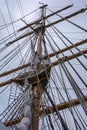 Main mast, crow's nest, sails, yards and rigging ropes on the deck of US coastguard tallship Eagle.