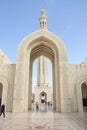 Main minaret and marble courtyard of Sultan Qaboos Mosque Royalty Free Stock Photo