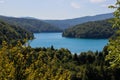 The main natural landmark of Croatia is the Plitvice Lakes with cascades of waterfalls. Emerald clear cold water on the background