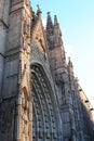 Main portal of Cathedral of the Holy Cross and Saint Eulalia on sunset at Gothic Quarter in Barcelona, Spain