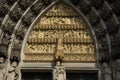 Main portal of Cologne Cathedral in the center statue of Mary with baby Jesus Royalty Free Stock Photo