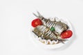 Two raw fish on a white plate Royalty Free Stock Photo