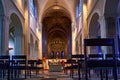 Main room of the Brunswick Cathedral with the altar and the chandelier at the front of the gothic building