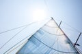 Main sail of a sailing boat against sunny sky Royalty Free Stock Photo