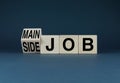 Main or Side Job. The cubes form the selection words Main or Side Job Royalty Free Stock Photo