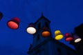 Main square with beautiful city lights in Szentendre Hungary next to Budapest with colorful banner light decorations and Royalty Free Stock Photo