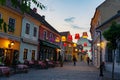 Main square with beautiful city lights in Szentendre Hungary next to Budapest with colorful banner light decorations