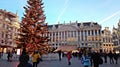 Main square of brussel, belgium, christmas period. festively decorated city with lights and other decorations.