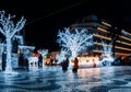 Main Square of Cascais covered in bright illuminated Christmas lights and seasonal decorations at night