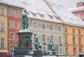 Main square Hauptplatz with Erzherzog Johann fountain and historical buildings in the background, in winter, in Graz, Styria