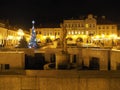 Main square in historical Bielsko-Biala city center, Poland with old buildings, christmas tree, street lamps at night