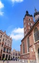 Main square market in Krakow,next to Mariacki Church, daily view,historic center and ancient architecture. Royalty Free Stock Photo