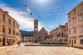 Main square in old medieval town Hvar with seagull's flying over. Hvar is one of most popular tourist destinations in Croatia in Royalty Free Stock Photo