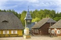 Main square of reconstructed old lithuanian city, a belfry of fire department, supermarket and some other buildings.