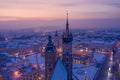 Main square Rynek of the Old Town of Krakow Poland in winter. St. Mary Basilica Gothic church, Town Hall Tower, Krakow Cloth Hall Royalty Free Stock Photo