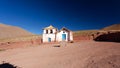 View of main square surrounded of a mud bricked coutyard. Taken during springtime at Village of Machuca at Los Flamencos national Royalty Free Stock Photo