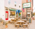 Main St Goodness and outdoor dining tables small New York village in Fall