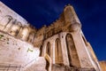 Main staircase of Palace of the Popes at night in Avignon city