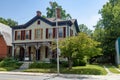 Main street of an old American city with traditional buildings. Wooden houses with carved steps Royalty Free Stock Photo