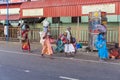 In the main street, Unidentified Hindu pilgrims people ready to go to the temple by walking, after the bath at the gate. Great tim