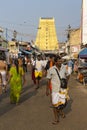 In the main street, Unidentified Hindu pilgrims people ready to go to the temple by walking, after the bath at the gate. Great tim