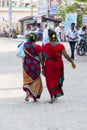 In the main street, Unidentified Hindu pilgrims people ready to go to the temple by walking, after the bath at the gate. Great tim