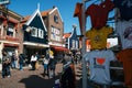 Main street of Volendam with cafe, shops and stalls