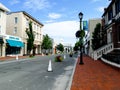 Main street in Westport with blue sky and clouds in hot Summer day