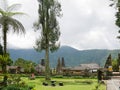 Main temple on the water in Bali, Pura Oolong Danu Bratan, Lake Bratan, beautiful temple, water around the temple, statues in Bali