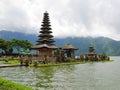 Main temple on the water in Bali, Pura Oolong Danu Bratan, Lake Bratan, beautiful temple, water around the temple, statues in Bali