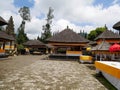 Main temple on the water in Bali, Pura Oolong Danu Bratan, Lake Bratan, beautiful temple, water around the temple, statues in Bali