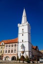 Main town Peace square, gothic white city hall tower, House at the golden sun, Medieval street, renaissance historical buildings, Royalty Free Stock Photo