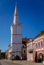 Main town Peace square, gothic white city hall tower, House at the golden sun, Medieval street, renaissance historical buildings, Royalty Free Stock Photo