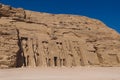 The main view of an Entrance to the Great Temple at Abu Simbel with Ancient Colossal statues of Ramesses II Royalty Free Stock Photo