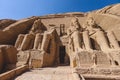 The main view of an Entrance to the Great Temple at Abu Simbel with Ancient Colossal statues of Ramesses II Royalty Free Stock Photo