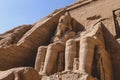 The main view of an Entrance to the Great Temple at Abu Simbel with Ancient Colossal statues of Ramesses II Royalty Free Stock Photo